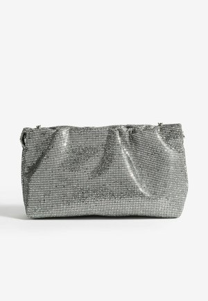 Silver handbag with a textured mesh design, featuring a gathered top and a spacious body. Smooth, reflective surface with minimal hardware.