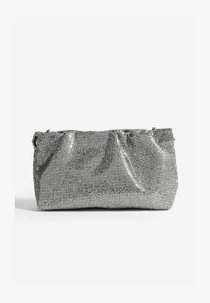 Silver handbag with a textured mesh design, featuring a gathered top and a spacious body. Smooth, reflective surface with minimal hardware.