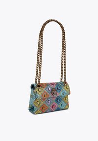 Beaded shoulder bag featuring a vibrant diamond pattern with multicolored accents, chain strap, and snap closure. Textured fabric.