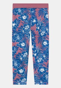 Blommiga leggings med en rosa bakgrund och stora blå och vita hibiskusblommor, mjukt material och en elastisk midja.