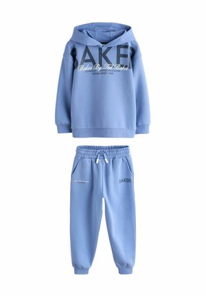 Blue hoodie and matching sweatpants set. Hoodie features large "BAKER" text; pants have pockets and embroidered logo. Soft material, relaxed fit.