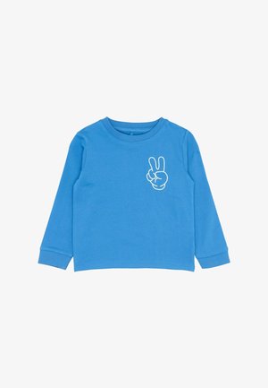 Camicia a maniche lunghe blu in cotone, con una grafica di un segno di pace bianco sull'area sinistra del petto. Design semplice con polsini a coste.