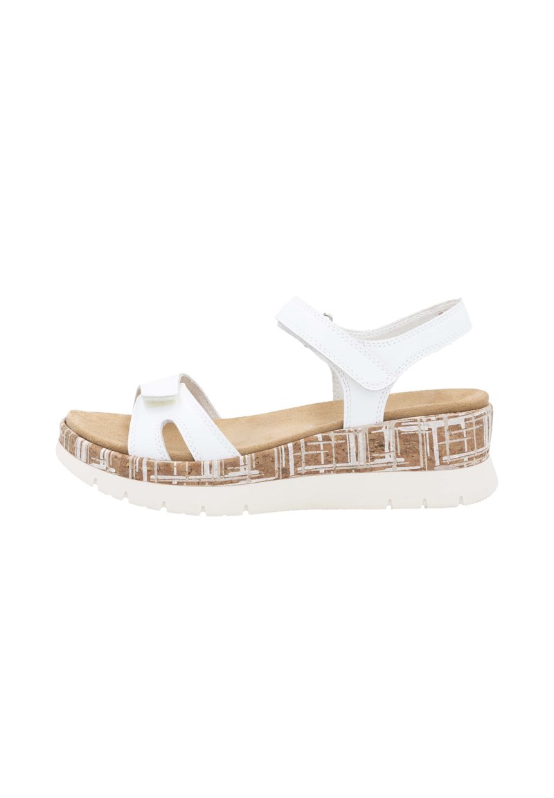 White sandal with two adjustable straps, a textured light brown and white patterned wedge sole, and a cushioned footbed.