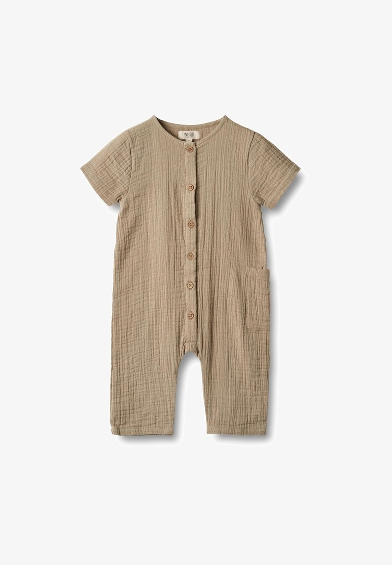 Romper per neonati beige a maniche corte con bottoni frontali, tessuto testurizzato, scollatura rotonda e una piccola tasca sul lato destro.