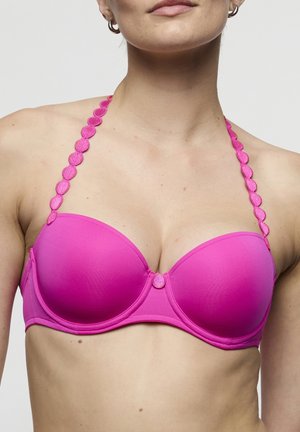 Roze beha met een gladde afwerking, voorgevormde cups en ronde accentbandjes. Voorzien van een decoratieve knoop in het midden voor extra detail.