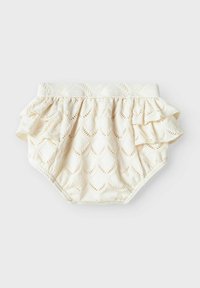 Pannolino coprente di colore crema chiara con bordini arricciati. Presenta un motivo a foglie e un tessuto a trama. Vita elastica per una vestibilità perfetta. Morbido materiale in cotone.