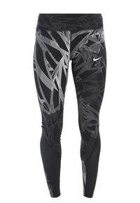 Leggings atletici neri con un motivo geometrico grigio, cintura elastica e logo Nike discreto. Realizzati in tessuto elasticizzato.