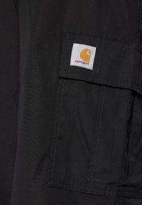 Carhartt WIP COLE PANT - Cargobukser - black rinsed