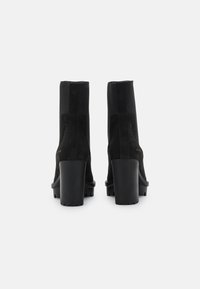 Copenhagen Studios Botines de tacón - black