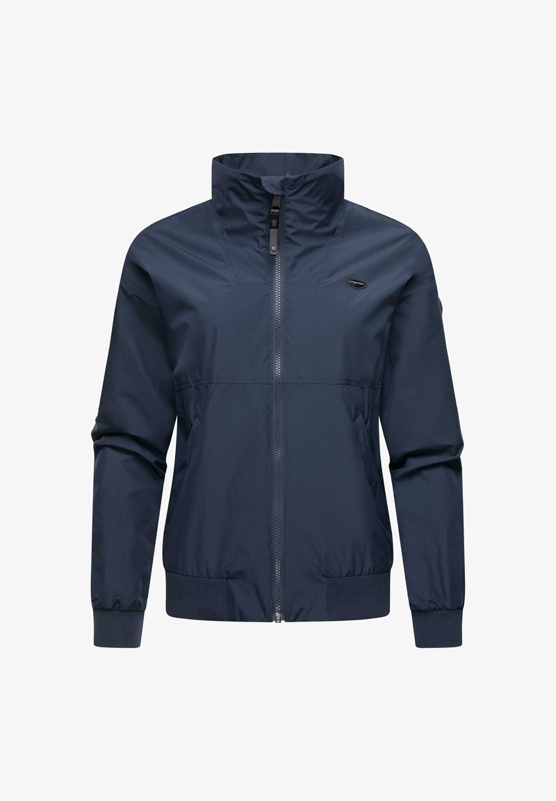 Jūros mėlynos spalvos vėjaparkas, lengvas audinys, pilnas užtrauktukas, aukštas apykaklė, elastiniai rankogaliai, šoninės kišenės, lygus paviršius, minimalus ženklinimas.