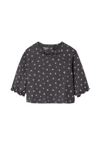 Dark gray short-sleeve top with a ruffled neckline and white floral patterns. Soft fabric with a relaxed fit and slightly flared sleeves.