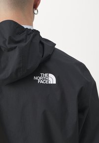 The North Face HIGHER RUN RAIN JACKET - Waterproof jacket - black