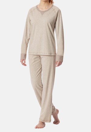 Maglietta beige a maniche lunghe con scollatura e polsini a costine, abbinata a pantaloni larghi coordinati. Tessuto morbido con una sottile trama.