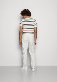 Levi's® XX CHINO EZ TAPER II - Calças - sodium white s twill gd