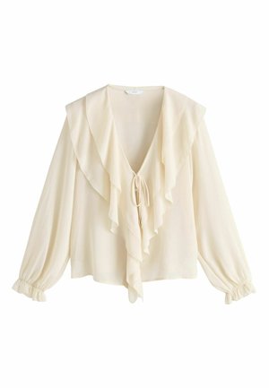 Cremefarbene Bluse aus leichtem Stoff mit tiefem V-Ausschnitt, großem Rüschenbesatz und gesammelten elastischen Bündchen an den Ärmeln.