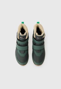 Green hiking shoes with textile and synthetic upper, fleece lining, and adjustable Velcro straps. Rubber outsole with textured grip.