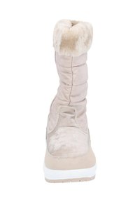 Botas de invierno beige con parte superior acolchada y cuello de piel sintética. Presentan una suela blanca y una textura suave. Detalle con cremallera en el lateral.