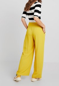 River Island Tygbyxor - yellow
