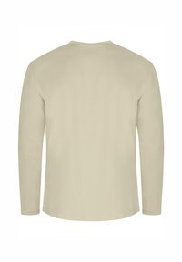 Langarm-T-Shirt in hellem Beige, aus weicher Baumwolle, mit Rundhalsausschnitt und geradem Saum sowie minimalen Nähdetails.