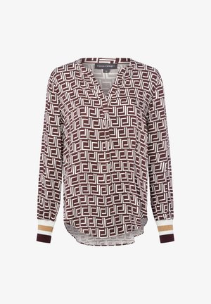 Long-sleeve blouse with brown and white geometric square pattern, V-neck, and ribbed cuffs in brown, white, and beige stripes.