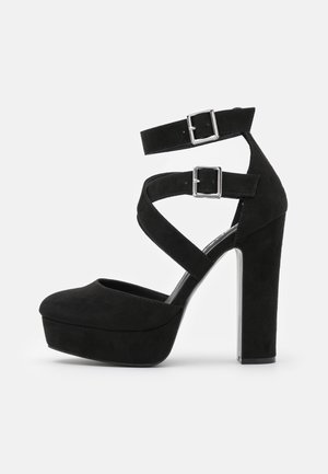 Højhælede pumps - black