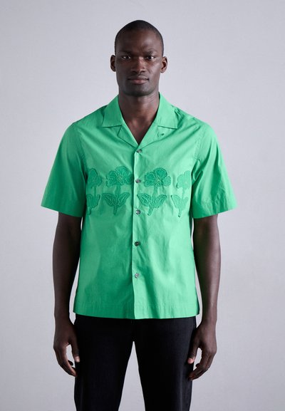 Green short-sleeve shirt made of cotton, featuring floral embroidery in darker green, button-down front, and a notched collar.