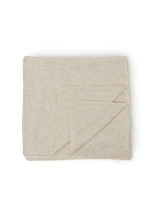Beige ullfilt som är snyggt vikt, med en mjuk, strukturerad yta och sydda kanter, med ett subtilt, enhetligt mönster.