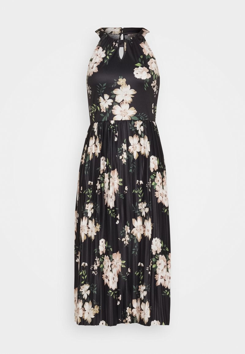 Robe noire à fleurs avec un col halter, jupe plissée, présentant de grandes fleurs crème et roses ainsi que des feuilles vertes. Détail de fermeture en ouverture en forme de clé au dos.