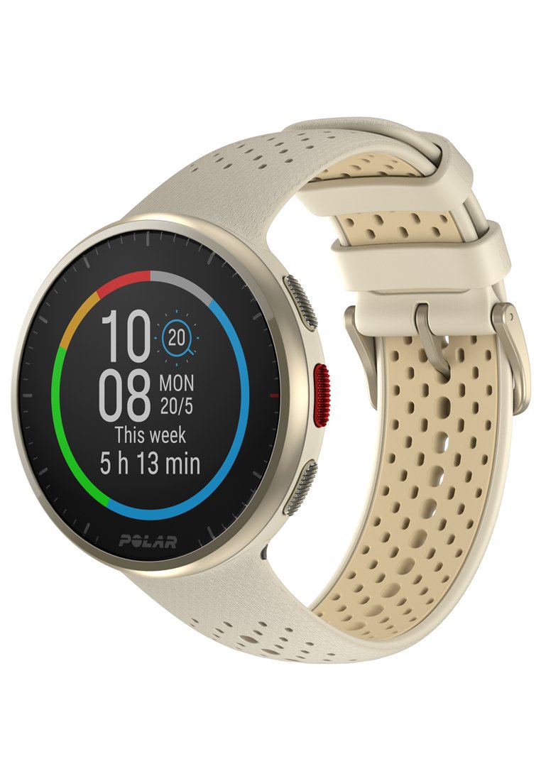 Orologio intelligente rotondo con display nero, cassa dorata e cinturino in silicone perforato beige chiaro con un pulsante laterale rosso.