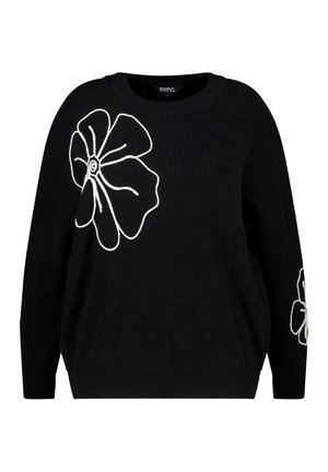 Zwarte gebreide sweater met witte bloembroderie op de voorkant en mouwen. Het heeft een losse pasvorm en een geribbelde textuur.
