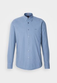 Light blue long-sleeve shirt made of smooth cotton, featuring a button-down collar, front buttons, and subtle logo on the chest.
