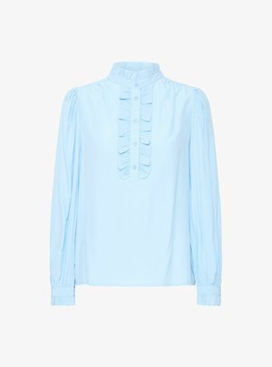 Világoskék, hosszú ujjú blúz, magas gallérral, fodros elülső panellel és gombos záródással. Puha anyag, ráncolt ujjak.