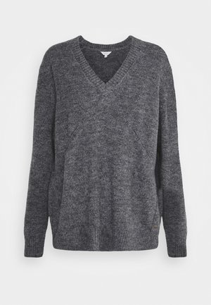 Maglione a V in maglia grigia scura, caratterizzato da maniche lunghe e una vestibilità rilassata, con polsini e orlo a coste e sottili dettagli laterali.