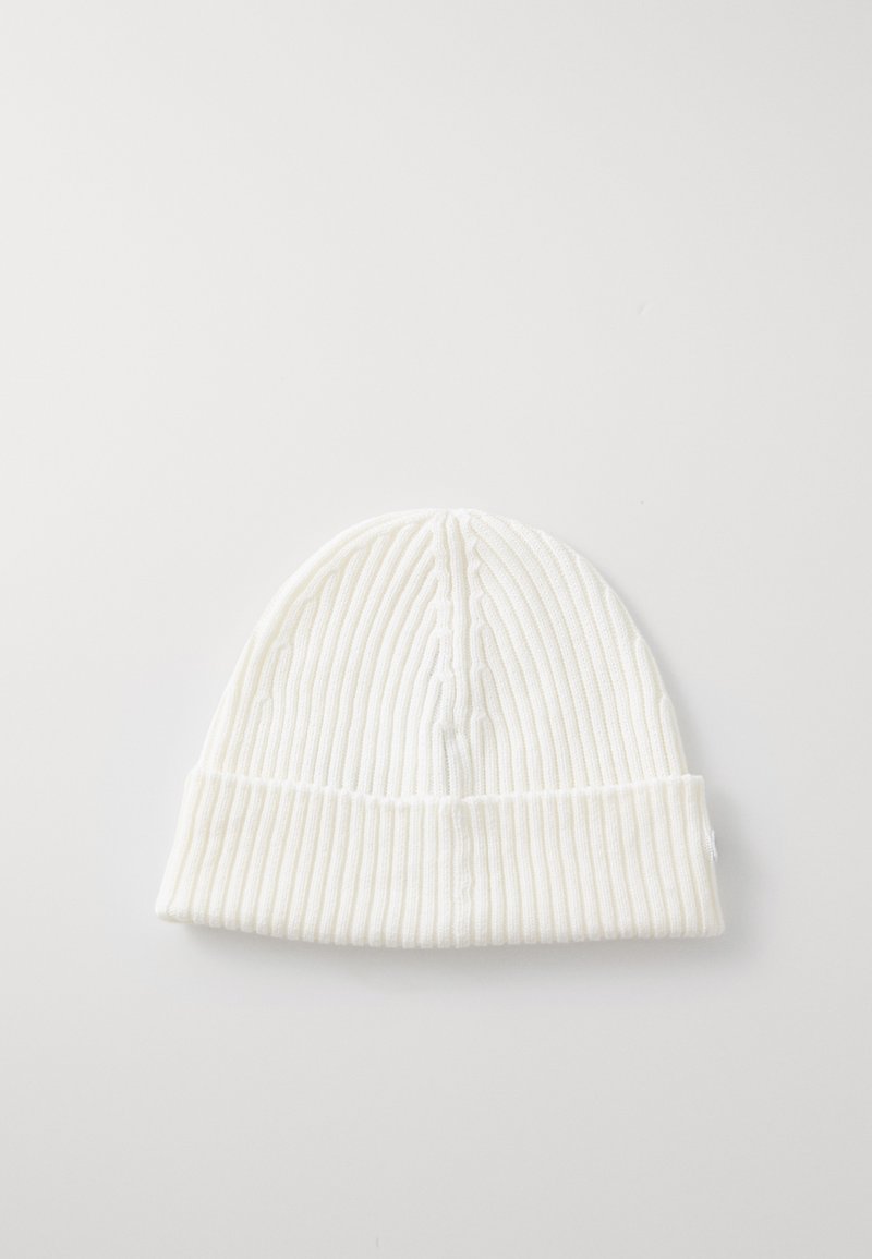 White knitted beanie hat with ribbed texture and a folded cuff. Features seamless crown construction and soft, stretchy fabric.
