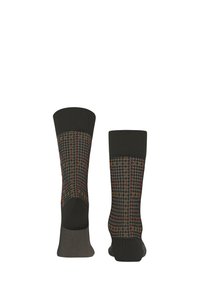 Par čarapa tamnog uzorka s houndstooth i vertikalnim crvenim i senf prugama, prikazane sa stražnje i bočne strane.