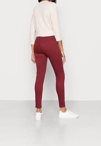 Marks & Spencer Skinny džíny - red