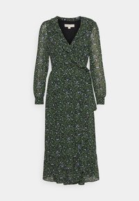 Vestido negro de manga larga con diseño de pequeñas flores en verde y morado claro, escote en V y cinturón atado en la cintura.