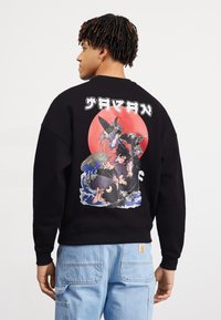 Alpha Industries - JAPAN WAVE WARRIOR  - Pulóver - black Miniatűr kép 1