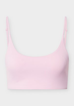 Bralette roz deschis fără cusături, cu bretele subțiri reglabile și un design simplu și neted.