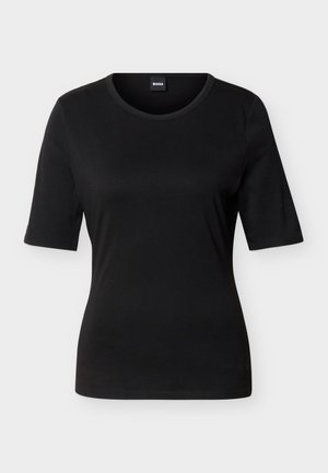 T-shirt noir ajusté à manches courtes avec col rond et étiquette de marque à l'intérieur du col arrière.