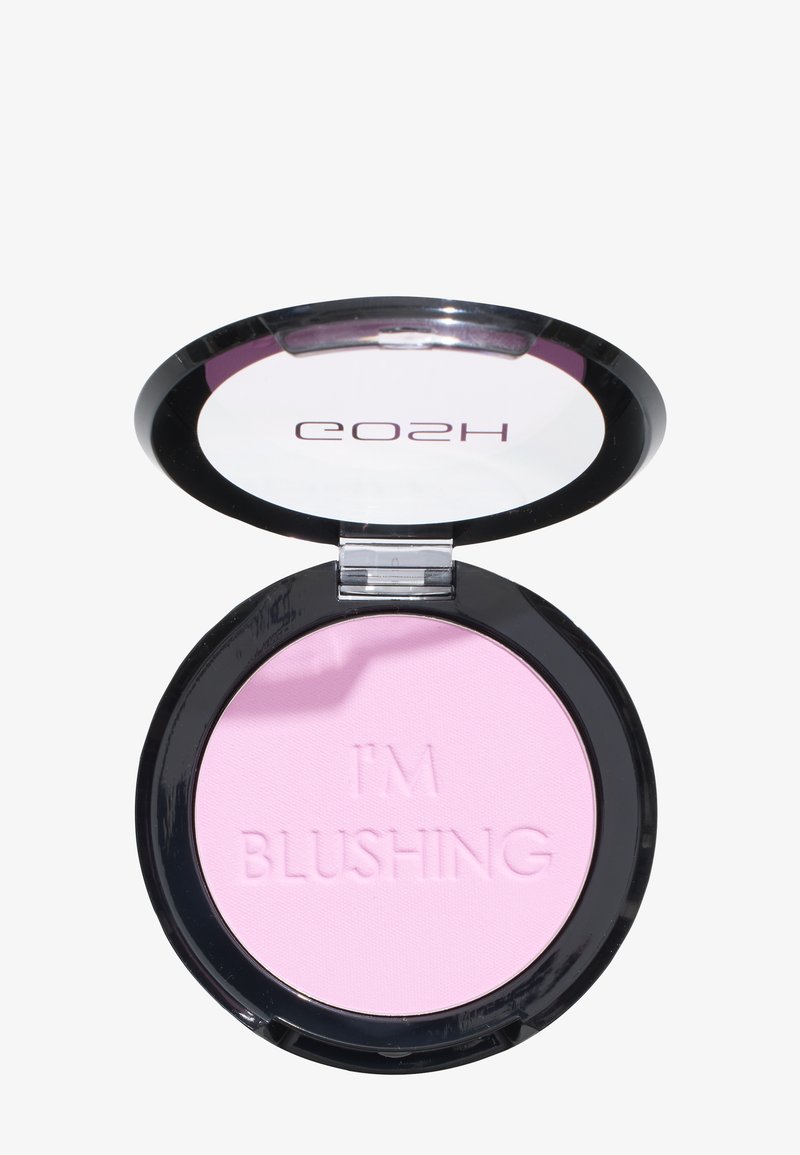 Étui noir compact avec un miroir contenant un blush en poudre rose clair embossé des mots "JE ROUGIS".