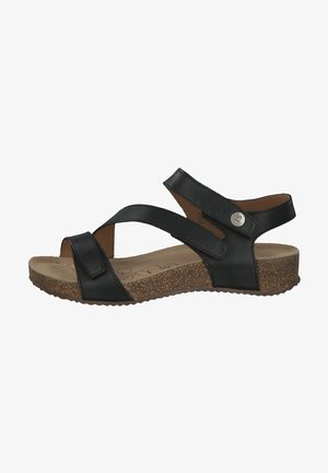 Zwarte leren sandaal met twee kruislijnen en een achterband, voorzien van een gestructureerde kurkachtige buitenzool en een licht gevoerd voetbed.