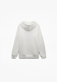 Sudadera blanca, tejido suave, corte relajado, mangas largas, ribete en el dobladillo y puños, con capucha redonda sin cordones, diseño liso.