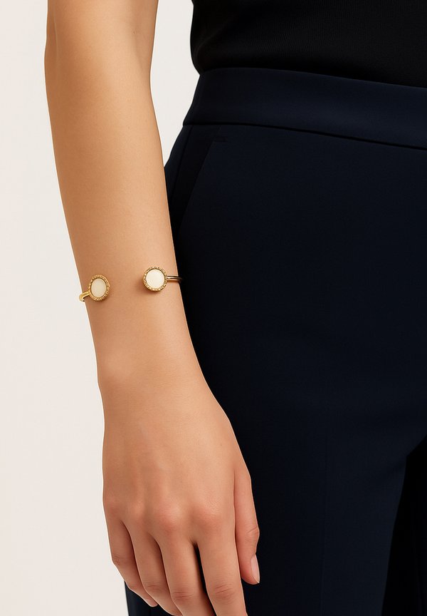 ELEGANTER MIT PERLMUTT-ENDEN - Armband