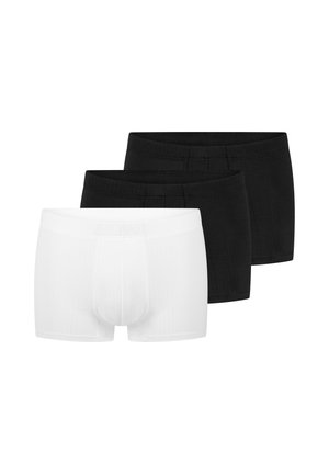 Tre par herre boxershorts, to sorte og et hvidt, arrangeret i en lagdelt række på en hvid baggrund.