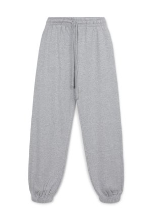 Graue Jogginghose aus weichem Material, mit einem elastischen Bund und Kordelzug, schmal zulaufenden Bündchen und einem lockeren Schnitt. Keine sichtbaren Muster.