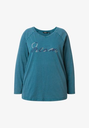 Maglietta a maniche lunghe color teal con scollo a V e maniche raglan. Presenta una grafica lucida "LET'S DREAM" con accenti scintillanti. Texture morbida.