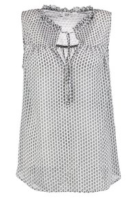 Blusa senza maniche in tessuto trasparente, con scollo volante e design a porta chiave. Sfondo bianco con un motivo floreale nero ripetuto.