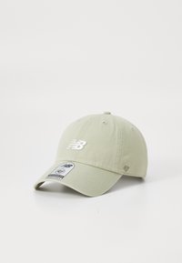 Light green adjustable baseball cap with white New Balance logo embroidered on front and a '47 Clean Up' sticker on the brim.