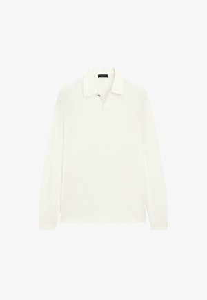 White long-sleeve polo shirt made of textured fabric, featuring a classic collar and a button at the neck for fastening.